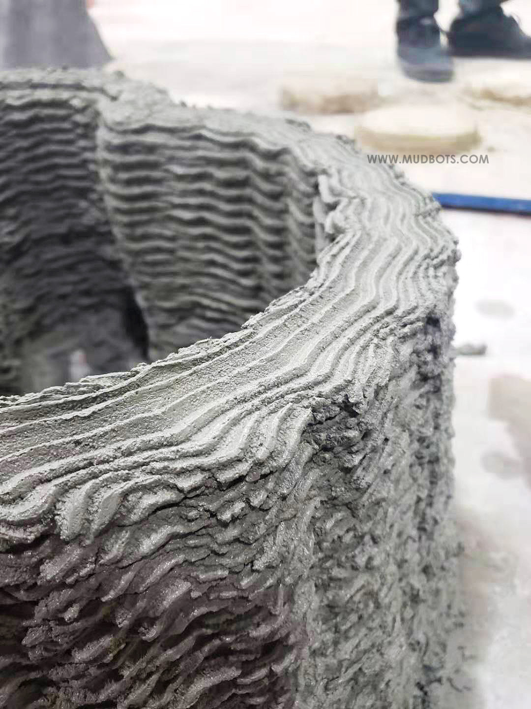 Here is a close up view of layer by layer printing of concrete structure